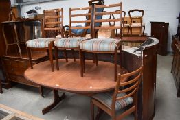 A G plan oval dining table and four ladder back chairs