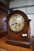 An early 20th Century oak cased mantel clock