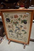 A traditional embroidered fire screen
