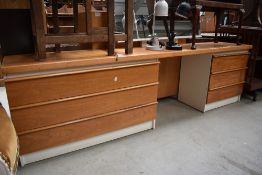A vintage teak and laminate dressing table