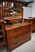 A Victorian mahogany dressing table having two under mirror drawers and two over two drawer base,