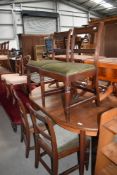 A set of four 19th Century rail back dining chairs