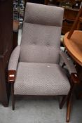 A vintage stained frame armchair, Parker Knoll or similar
