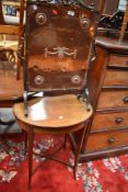 An Edwardian embossed copper fire guard having scroll foliate top and feet,AF, sold alongside an