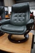 A Stressless recliner armchair, of wide proportions