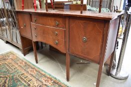 A reproduction Regency sideboard
