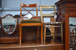 A chapel style chair, numbered 29 and a reproduction Regency style yew wood chair