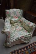A period style low seat easy chair with later loose cover