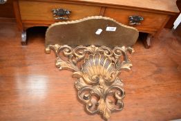 A gilt wood wall sconce