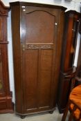 A mid 20th Century oak hall robe