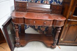 A Victorian mahogany dressing table in the Duchess style