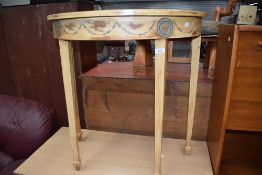 A vintage style painted semi circular hall table.