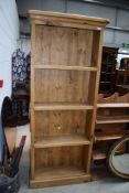 A modern rustic style shallow bookcase