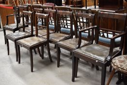 Eight mahogany chairs (two of which are carvers0 of early 20th century design, having rail back with