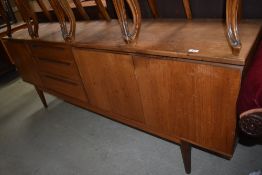 A vintage teak sideboard by Alfred Cox