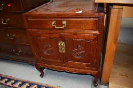 An Oriental hardwood side cabinet, width approx. 56cm