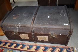 A vintage travel trunk, bearing railway labels etc