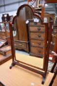 An Edwardian bathroom mirror on tilt frame