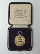 A 9ct Gold Blackburn & District Football Combination Medal with enamel on front, reverse Eddleston