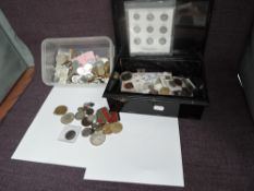 A collection of World Coins in plastic tub and a collection of Fantasy and copy Coins in cash box