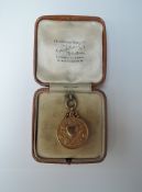 A 9ct Gold Blackburn-St Thomas Medal Comp, reverse Winners 1934, weight 23.3g