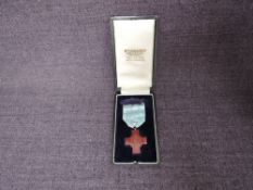 A Royal Albert Institution Enamel Medal to Nurse Florence A Coles 1916, with ribbon in case labelled