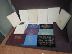 A collection of Fourteen Great Britain & Northern Ireland Royal Mint Proof Coin Year Sets, 1970-