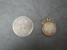 A South Africa Silver 2 1/2 Shillings 1892 and a South Africa Silver 1896 1 Shilling in a loose