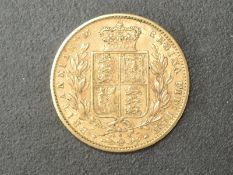 A Queen Victoria 1863 Young Head Gold Sovereign, Royal Mint, Die Number 6 below shield