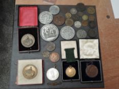 A collection of Medallions and Tokens, Medallions include London Institute, two Queen Victoria
