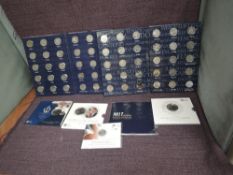 Two Lighthouse Sports Albums containing 29 2012 Olympic 50p Coins and one album has the extra
