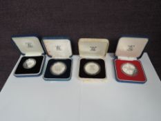 Four United Kingdom Royal Mint Silver Proof Coins, Silver Jubilee Crown, 1980 80th Birthday Crown,