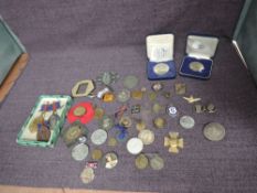 A collection of Medals, Badges, Medallions etc includes Victorian School Attendance Medals, Edward