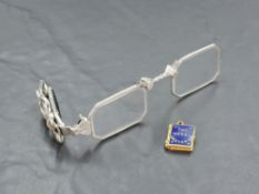 A pair of early 20th century German marcasite set white metal lorgnettes, of traditional design with