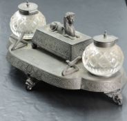 A Victorian silver-plated Egyptian revival desk stand, with central sarcophagus form compartment