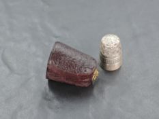 A cased white metal 'Dorcas' thimble, by Charles Horner, of traditional design with repeating