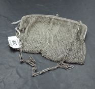 A silver mesh evening bag with clip clasp and carry chain, London 1919, Heasman & Co, bearing import