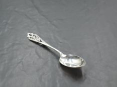 A Scottish silver teaspoon, with pierced thistle design to surmount, marks for Edinburgh 1966, maker