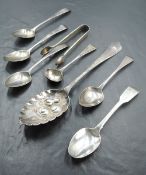 An 18th century silver table spoon, with later embossed and chased 'berry' decoration, indistinct