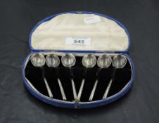A cased set of six silver coffee spoons, marks for Sheffield 1929, all housed in a hinged demi-