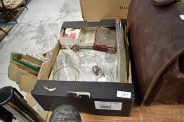 A selection of scientific chemistry equipment mostly glass vessels and test tubes etc