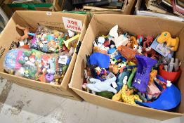 Two boxes of 1990/2000 Mcdonalds Toys and accessories