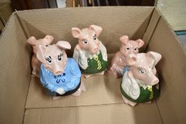 A family of 20th century Wade ceramic Nat West piggy banks