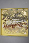 A tray of costume jewellery necklaces