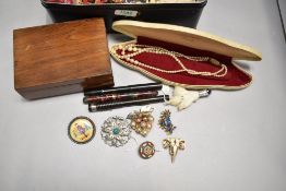 A box containing three fountain pens, a Waterman, a Burnham also a selection of costume jewellery