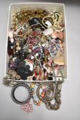 A large selection of costume jewellery bangles, necklaces, hatpins, bracelets etc