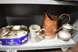 A 19th century pewter and brass banded tankard or Quart measure with copper jug similar tankard