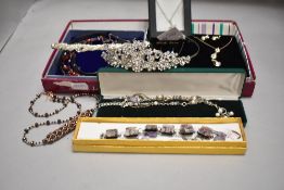 A collection of costume necklaces, tiaras including Swarovski