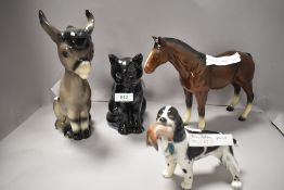 A selection of 20th century pottery figures including Trentham, Beswick and Alton