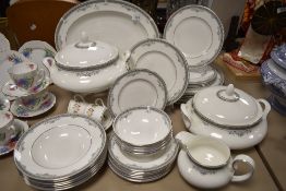 A partial Royal Doulton' York' dinner service to include tureens, bowls, platter,jug and plates.
